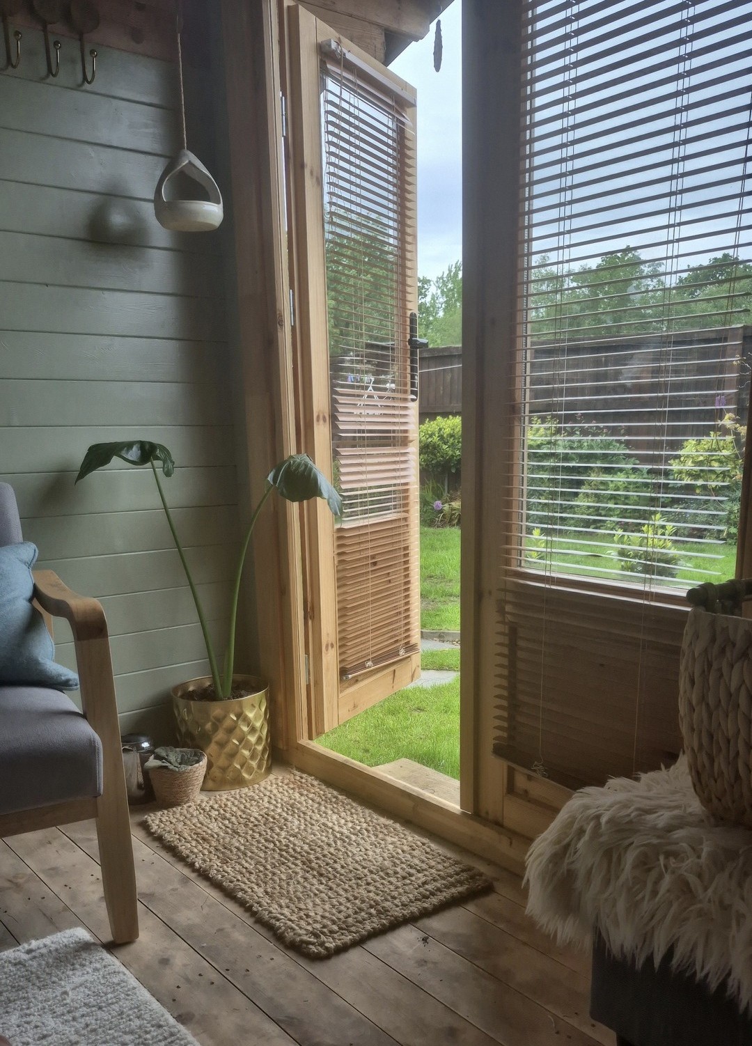 The treatment room doorway looking out onto the garden